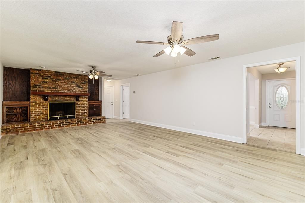 Empty room, Fireplace, Interior, Stone Walls, Wood Texture Flooring