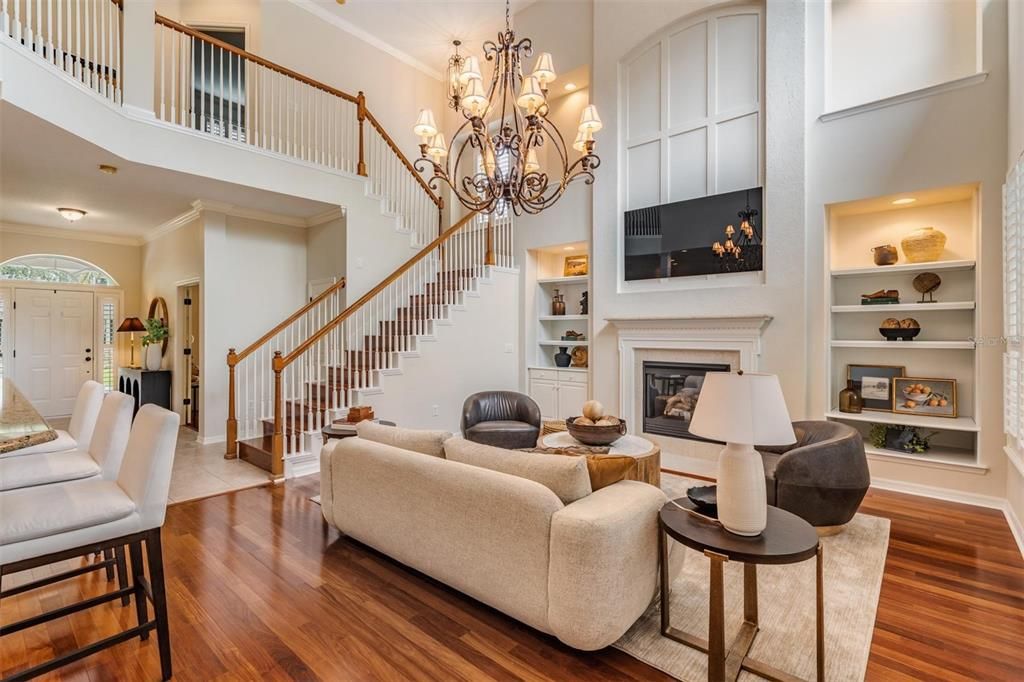 Chandelier, Fireplace, Interior, Living room, Recessed Lighting, Wood Texture Flooring