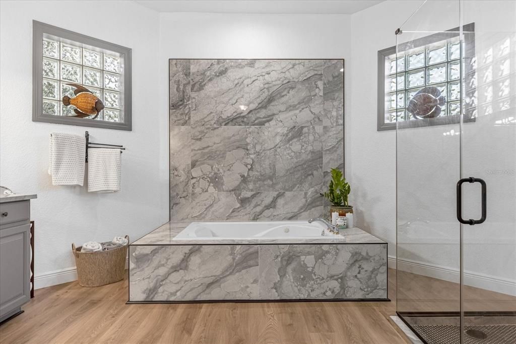 Bathroom, Glass Shower, Interior, Marble Walls, Wood Texture Flooring