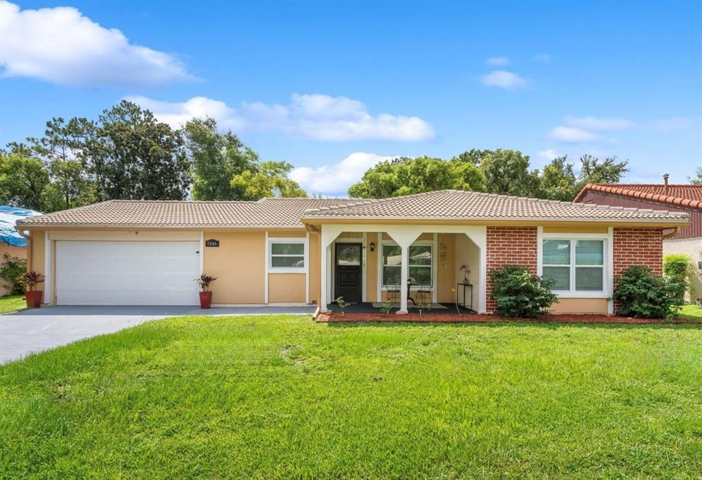 Attached, Backyard, Exterior, Facade, Brick Facade, Ranch