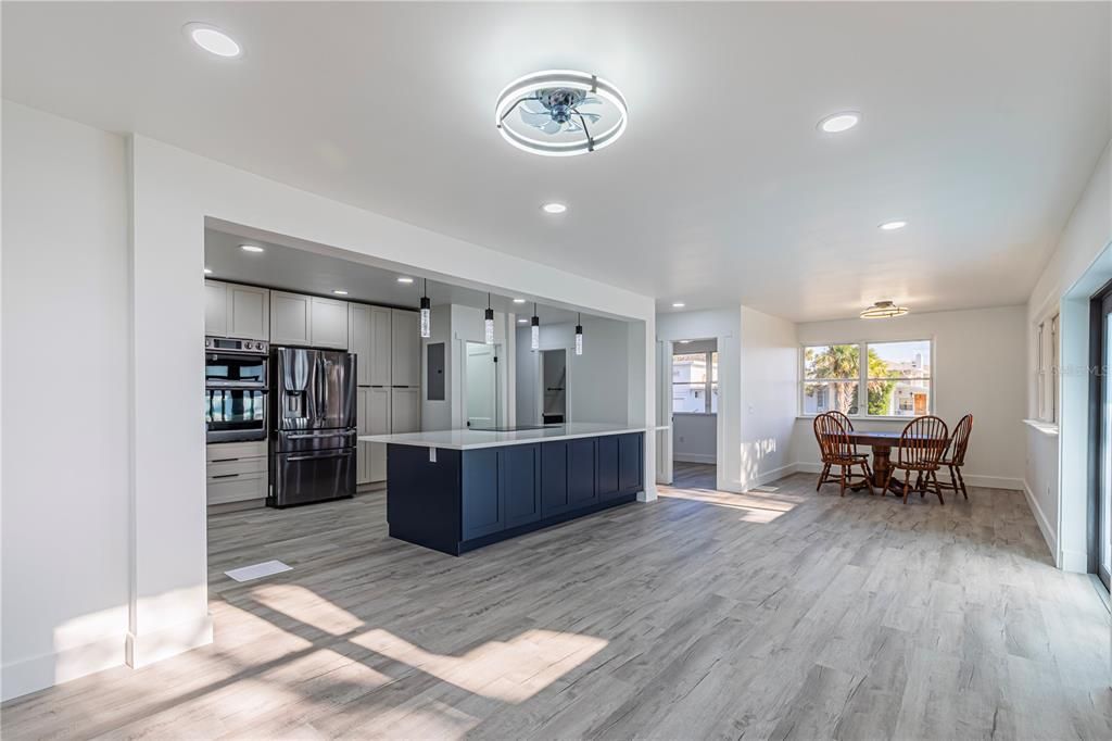 Dining room, Interior, Kitchen, Recessed Lighting, Stainless Steel Appliances, Wood Texture Flooring