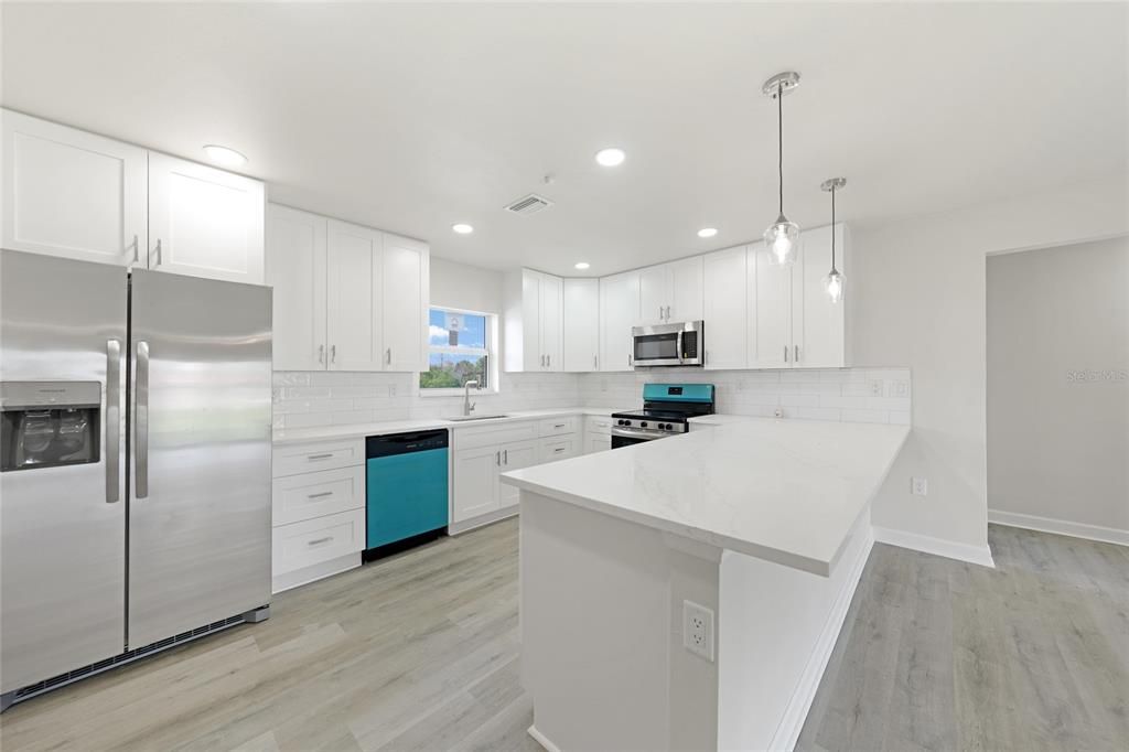 Interior, Kitchen, Pendant Lights, Recessed Lighting, Stainless Steel Appliances, Wood Texture Flooring