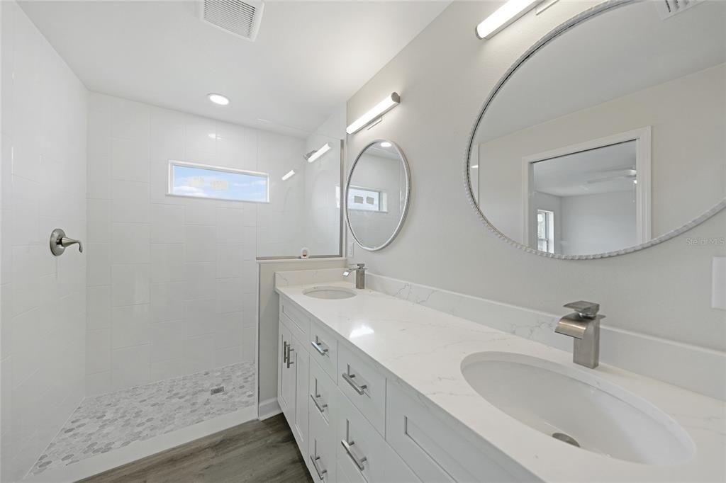 Bathroom, Dual Sink Vanities, Interior, Recessed Lighting, Wood Texture Flooring
