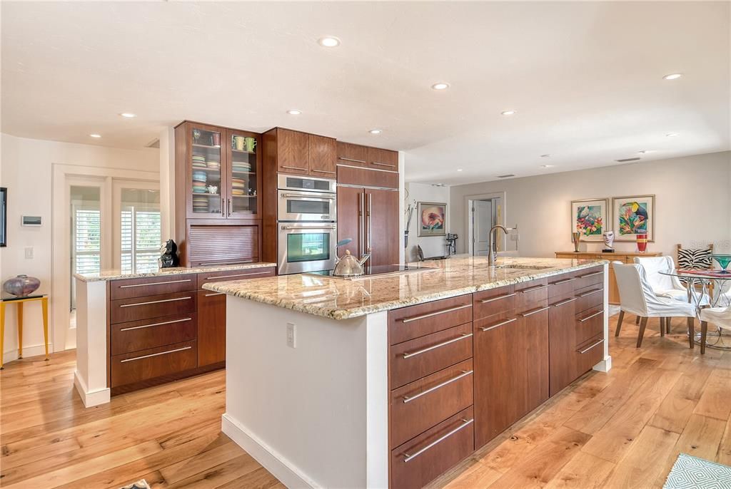 Dining room, Interior, Kitchen, Recessed Lighting, Stainless Steel Appliances, Wood Texture Flooring