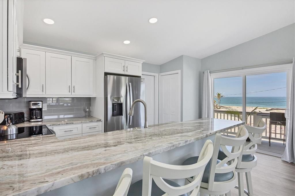 Interior, Kitchen, Recessed Lighting, Stainless Steel Appliances, Water, Wood Texture Flooring