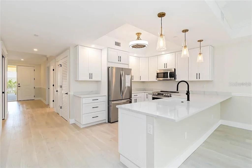 Interior, Kitchen, Pendant Lights, Recessed Lighting, Stainless Steel Appliances, Wood Texture Flooring