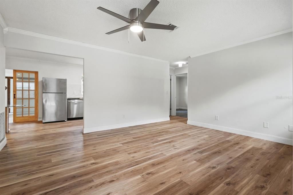 Empty room, Interior, Kitchen, Stainless Steel Appliances, Wood Texture Flooring