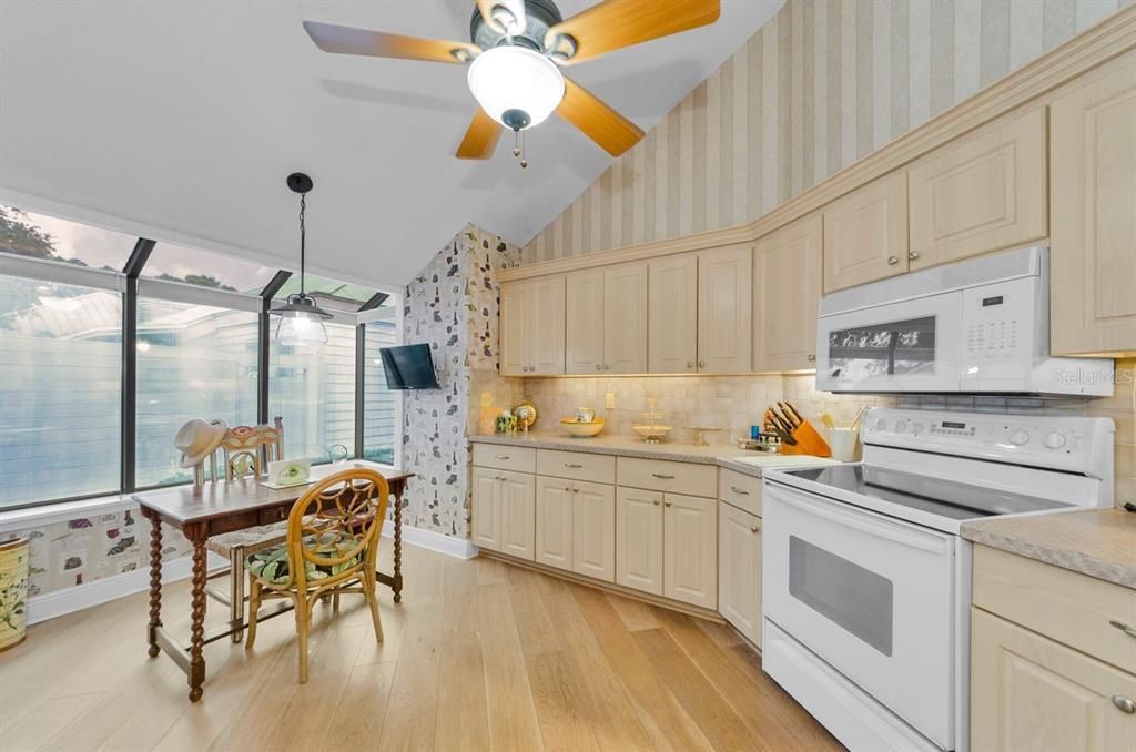 Dining room, Glass Ceilings, Interior, Kitchen, Pendant Lights, Sun Room, Water, Wood Texture Flooring
