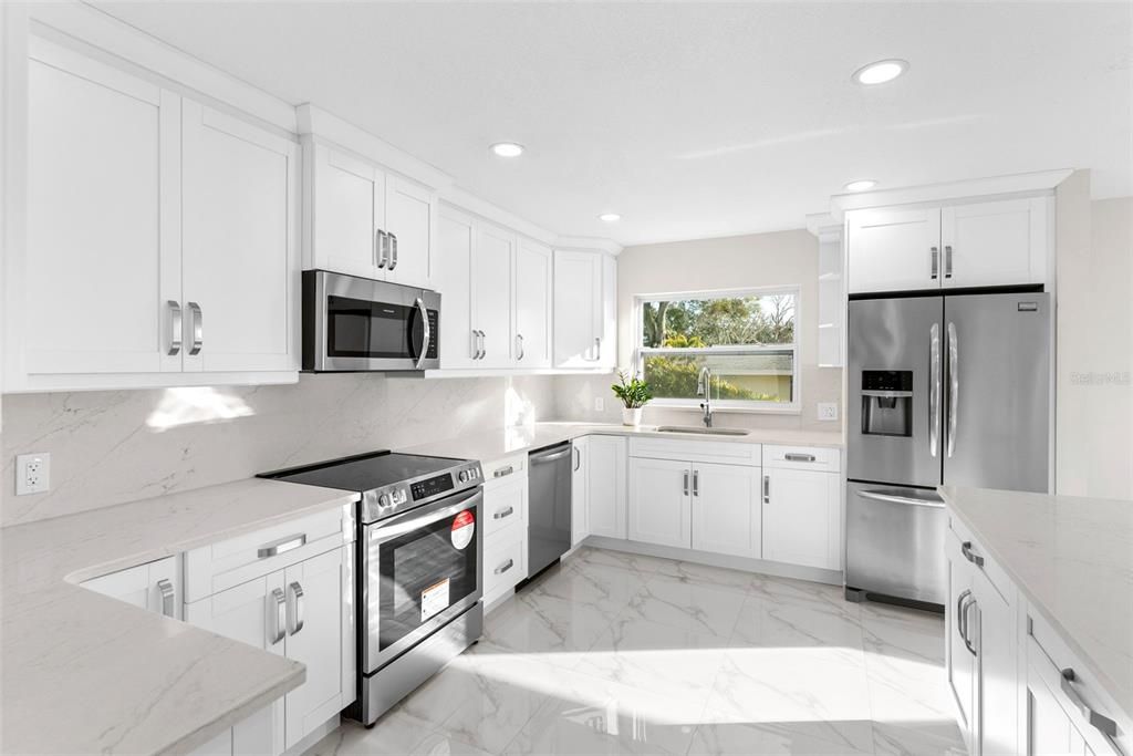 Interior, Kitchen, Marble, Marble Walls, Recessed Lighting, Stainless Steel Appliances