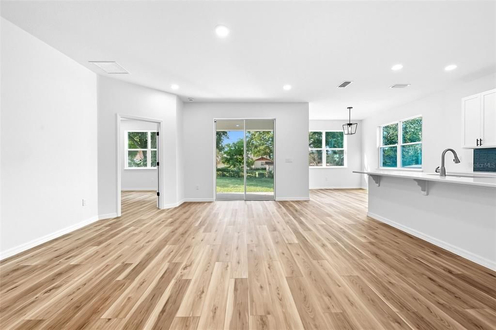 Empty room, Interior, Kitchen, Pendant Lights, Recessed Lighting, Wood Texture Flooring