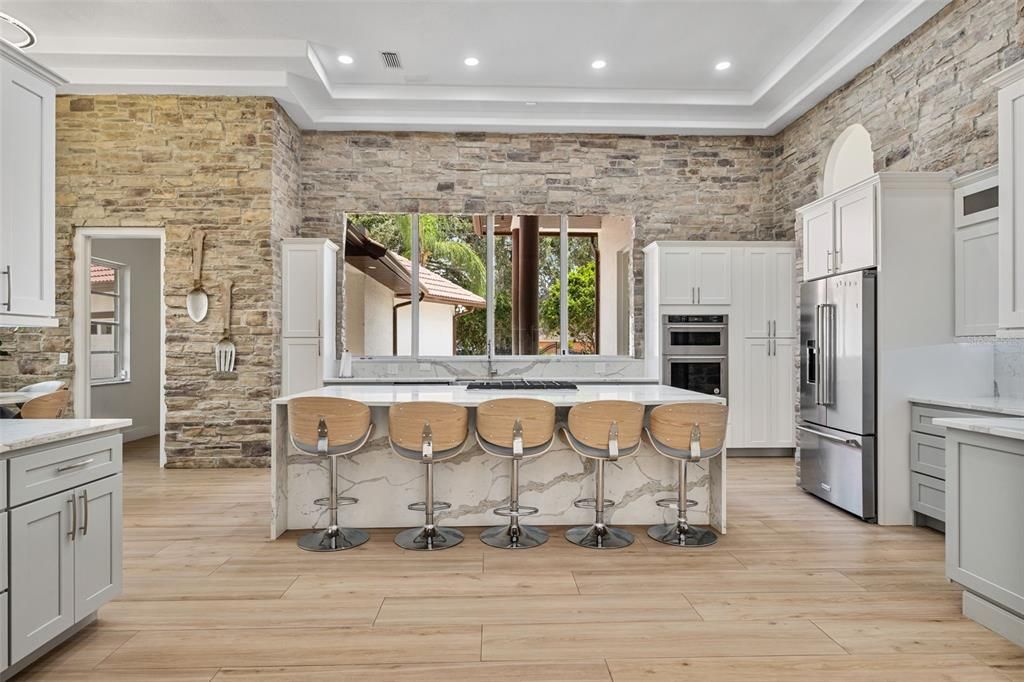 Interior, Kitchen, Recessed Lighting, Stainless Steel Appliances, Stone Walls, Wood Texture Flooring