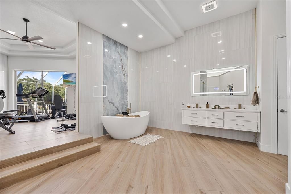 Bathroom, Fitness Equipment, Free Standing Baths, Interior, Recessed Lighting, Wood Texture Flooring