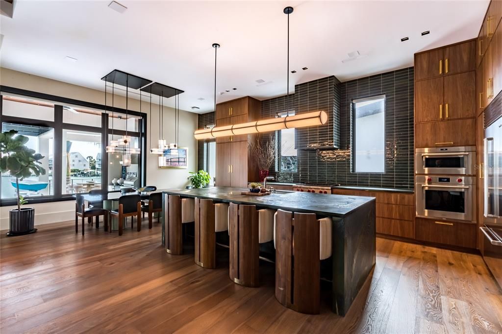 Dining room, Interior, Kitchen, Pendant Lights, Recessed Lighting, Stainless Steel Appliances, Wood Texture Flooring
