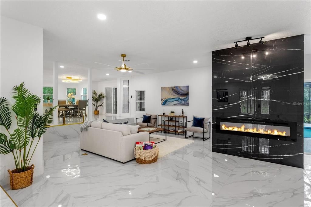 Dining room, Fireplace, Interior, Living room, Marble, Marble Walls, Recessed Lighting