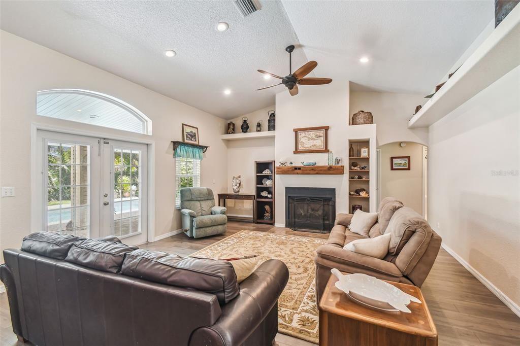 Fireplace, Interior, Living room, Recessed Lighting, Wood Texture Flooring