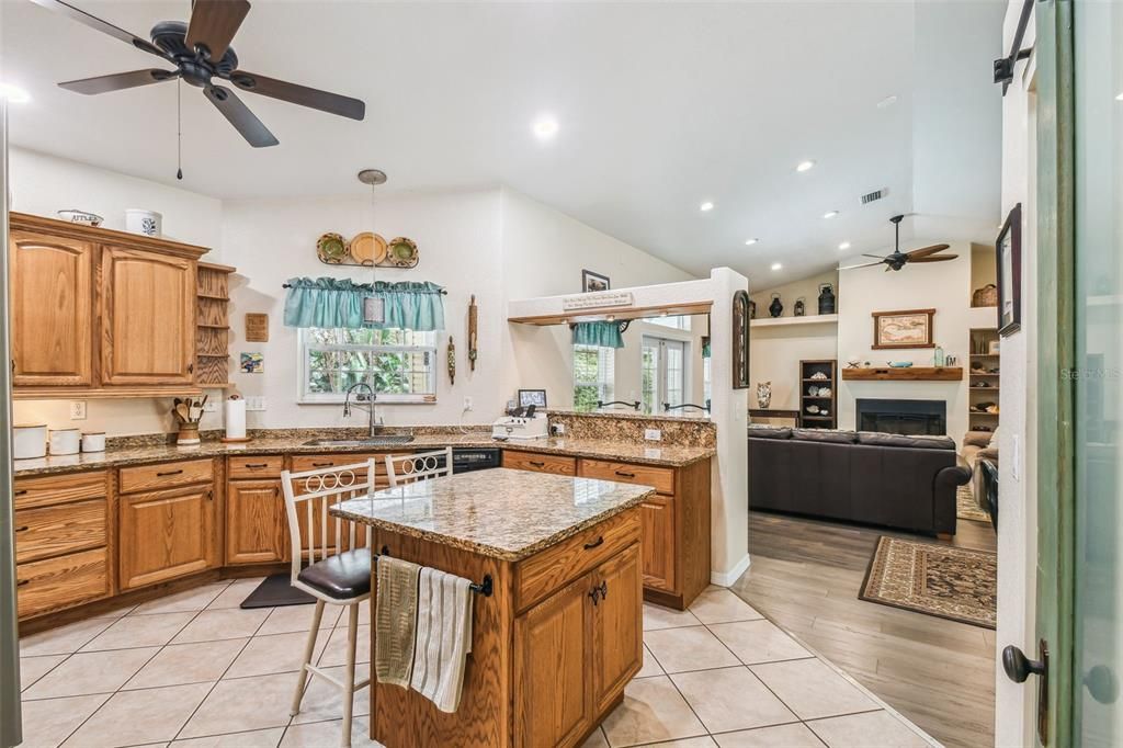 Fireplace, Interior, Kitchen, Living room, Recessed Lighting, Wood Texture Flooring