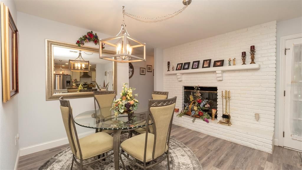 Dining room, Fireplace, Interior, Pendant Lights, Stone Walls, Wood Texture Flooring