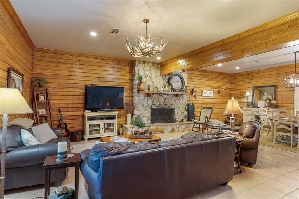 Dining room, Fireplace, Interior, Living room, Pendant Lights, Recessed Lighting, Stone Walls, Wooden Walls