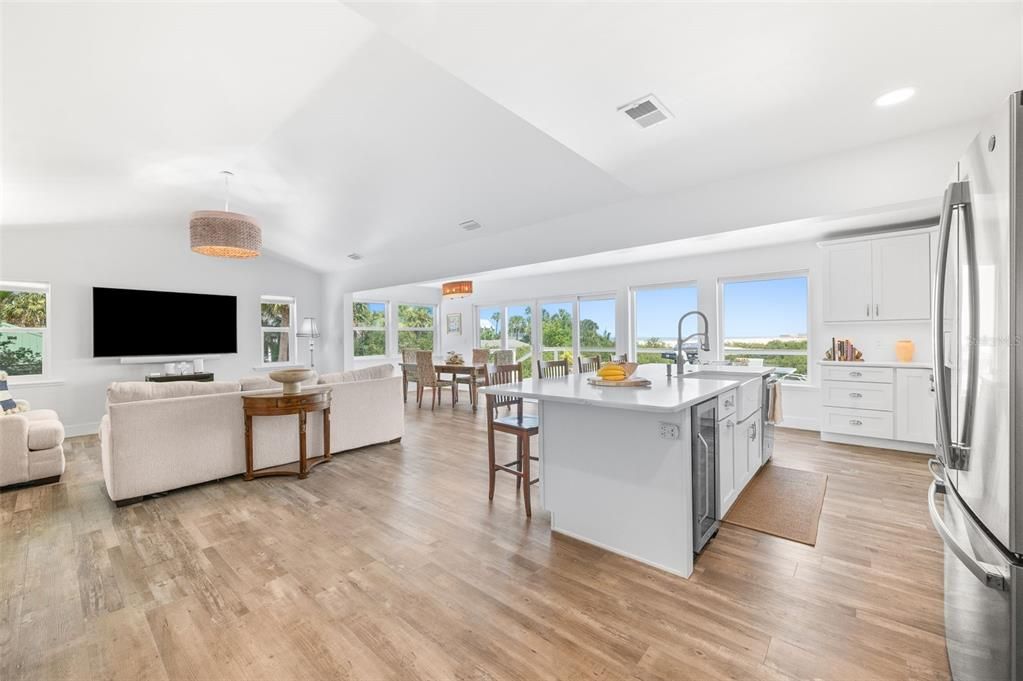 Dining room, Interior, Kitchen, Living room, Recessed Lighting, Stainless Steel Appliances, Wood Texture Flooring