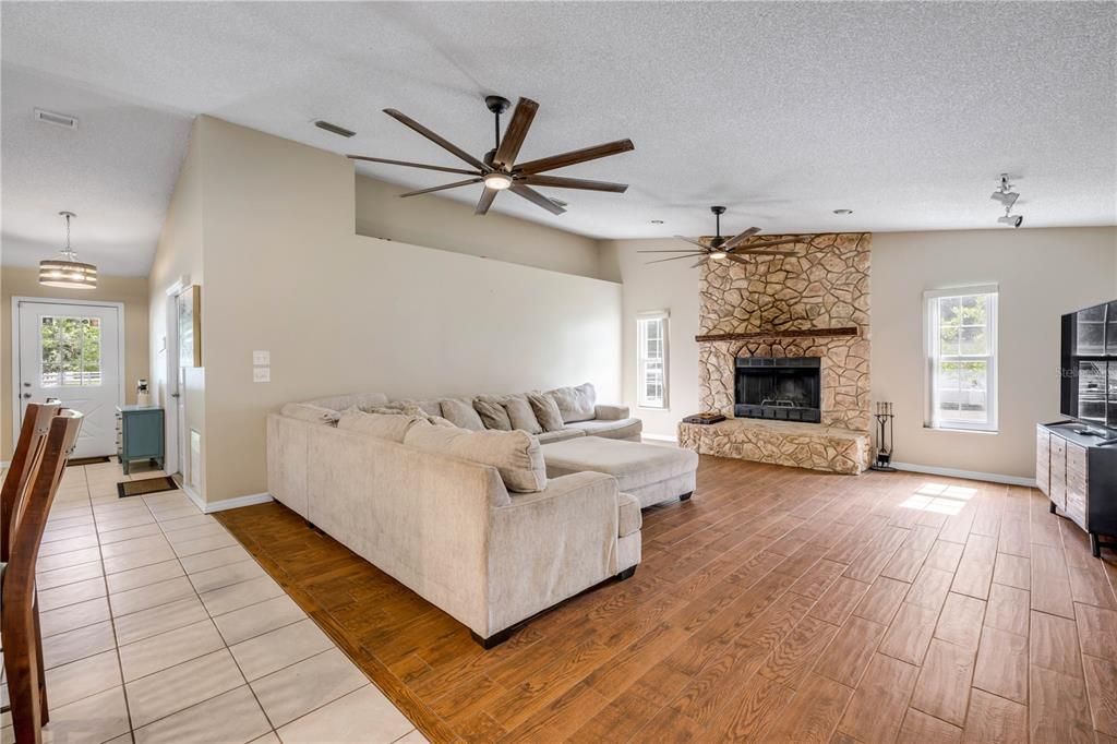 Fireplace, Interior, Living room, Pendant Lights, Stone Walls, Wood Texture Flooring