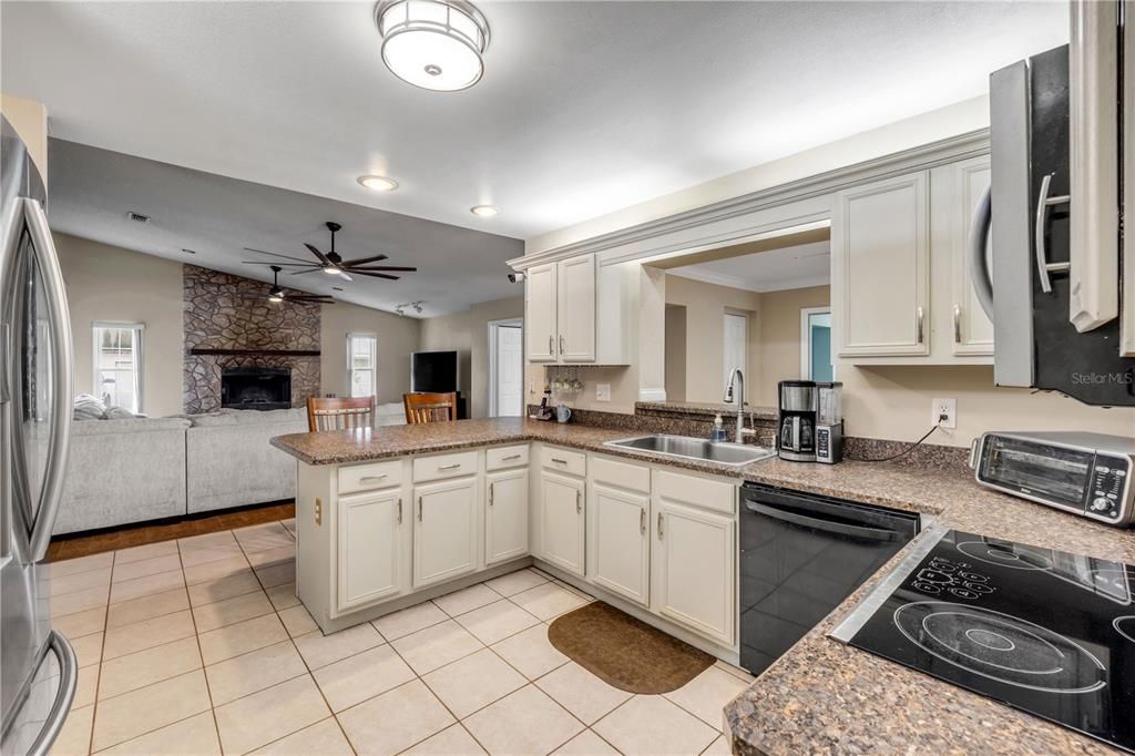Fireplace, Interior, Kitchen, Recessed Lighting, Stone Walls