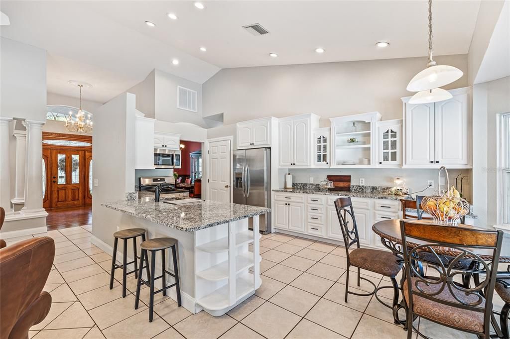 Chandelier, Dining room, Interior, Kitchen, Pendant Lights, Recessed Lighting, Stainless Steel Appliances