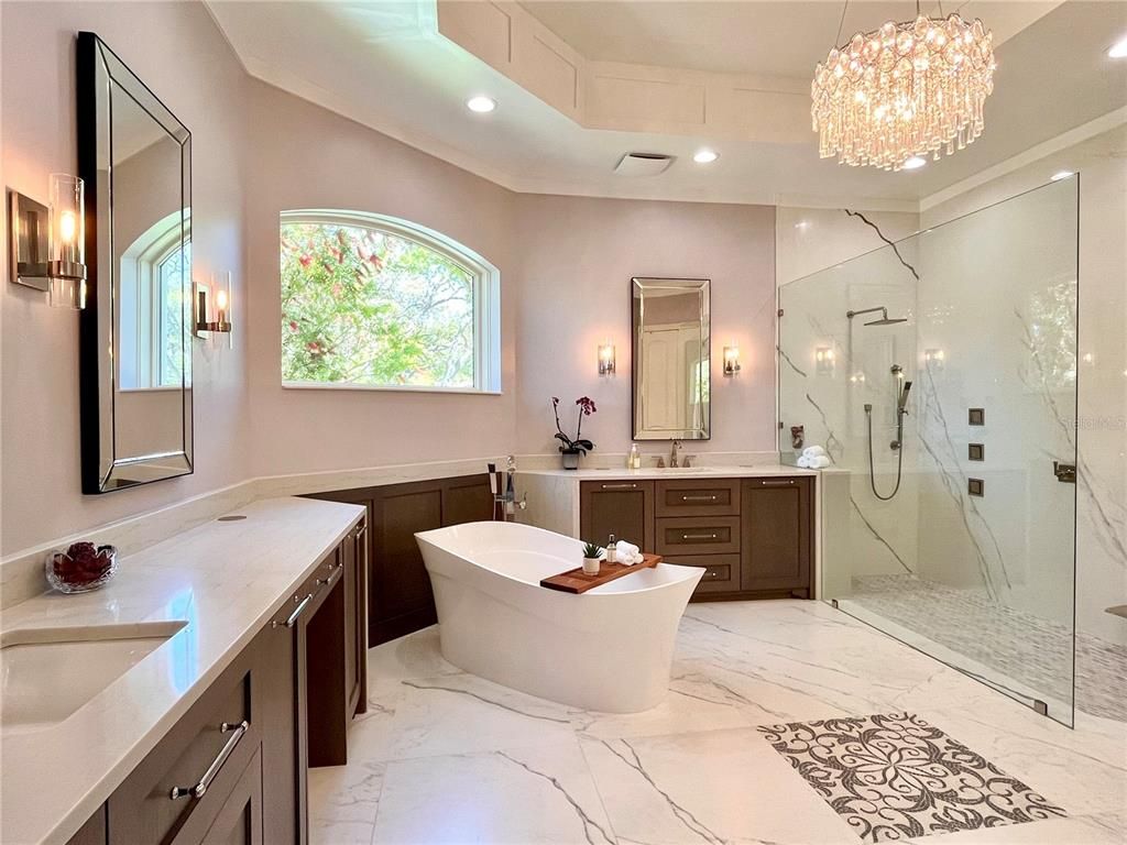 Bathroom, Chandelier, Dual Sink Vanities, Free Standing Baths, Glass Shower, Interior, Marble, Marble Walls, Recessed Lighting