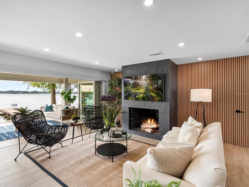 Fireplace, Interior, Living room, Recessed Lighting, Water, Wood Texture Flooring
