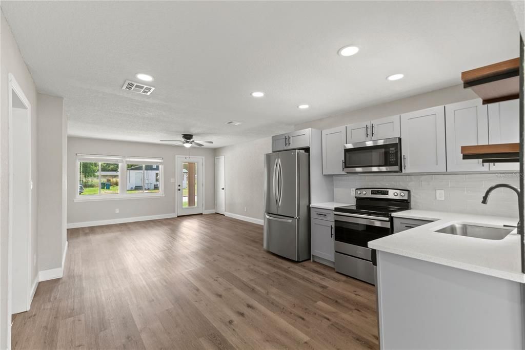 Interior, Kitchen, Recessed Lighting, Stainless Steel Appliances, Wood Texture Flooring