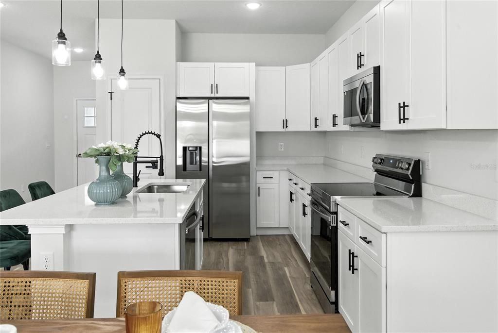 Interior, Kitchen, Pendant Lights, Recessed Lighting, Stainless Steel Appliances, Wood Texture Flooring