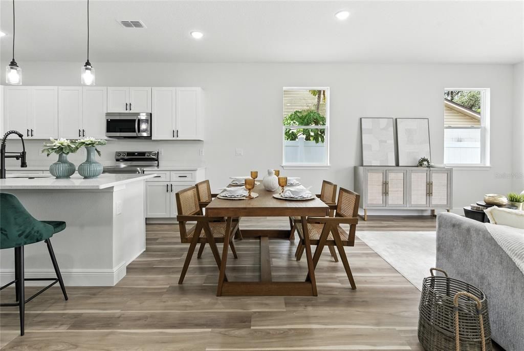 Dining room, Interior, Kitchen, Pendant Lights, Recessed Lighting, Stainless Steel Appliances, Wood Texture Flooring