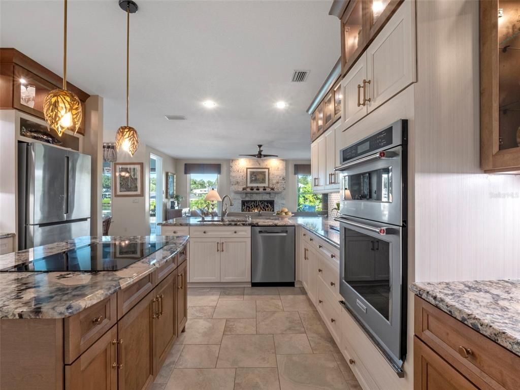 Interior, Kitchen, Pendant Lights, Recessed Lighting, Stainless Steel Appliances, Stone Walls
