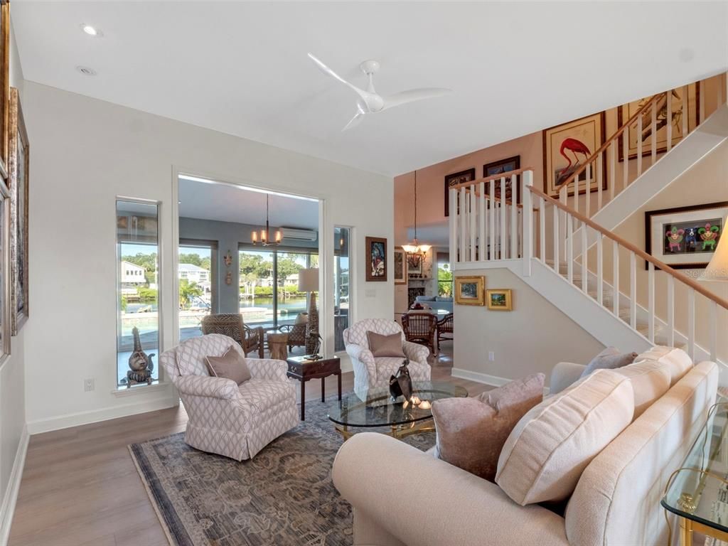 Chandelier, Dining room, Interior, Living room, Pendant Lights, Recessed Lighting, Wood Texture Flooring