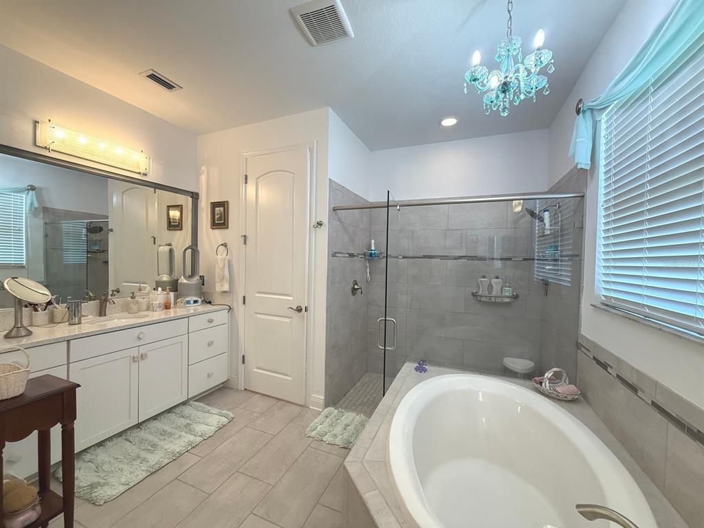 Bathroom, Dual Sink Vanities, Glass Shower, Interior, Recessed Lighting, Wood Texture Flooring
