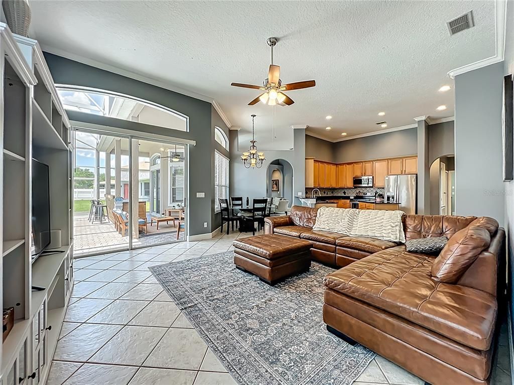 Chandelier, Dining room, Interior, Kitchen, Living room, Recessed Lighting, Stainless Steel Appliances