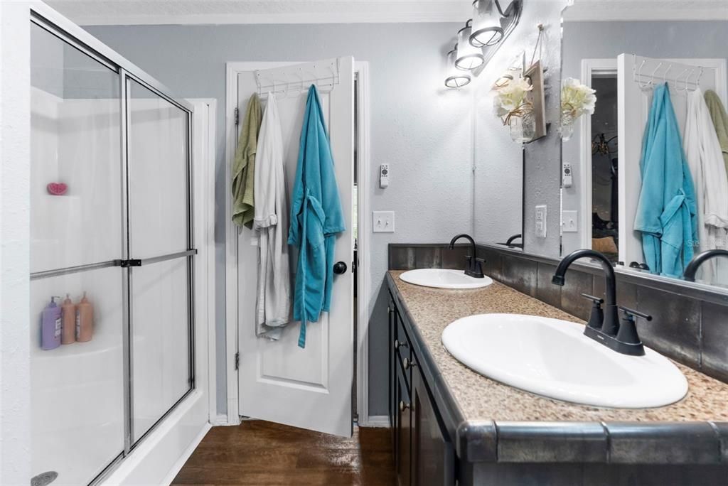 Bathroom, Dual Sink Vanities, Glass Shower, Interior, Wood Texture Flooring