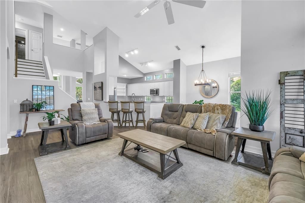 Dining room, Interior, Kitchen, Living room, Pendant Lights, Recessed Lighting, Stainless Steel Appliances, Wood Texture Flooring