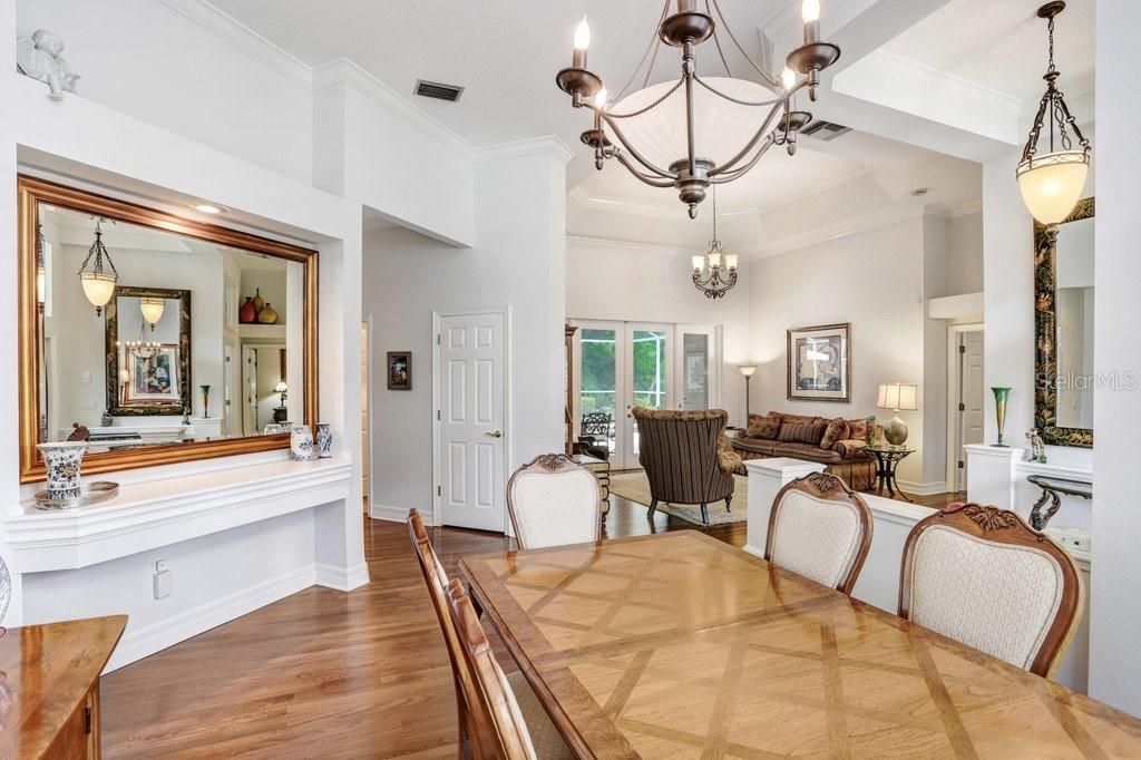 Chandelier, Dining room, Fireplace, Interior, Living room, Pendant Lights, Wood Texture Flooring