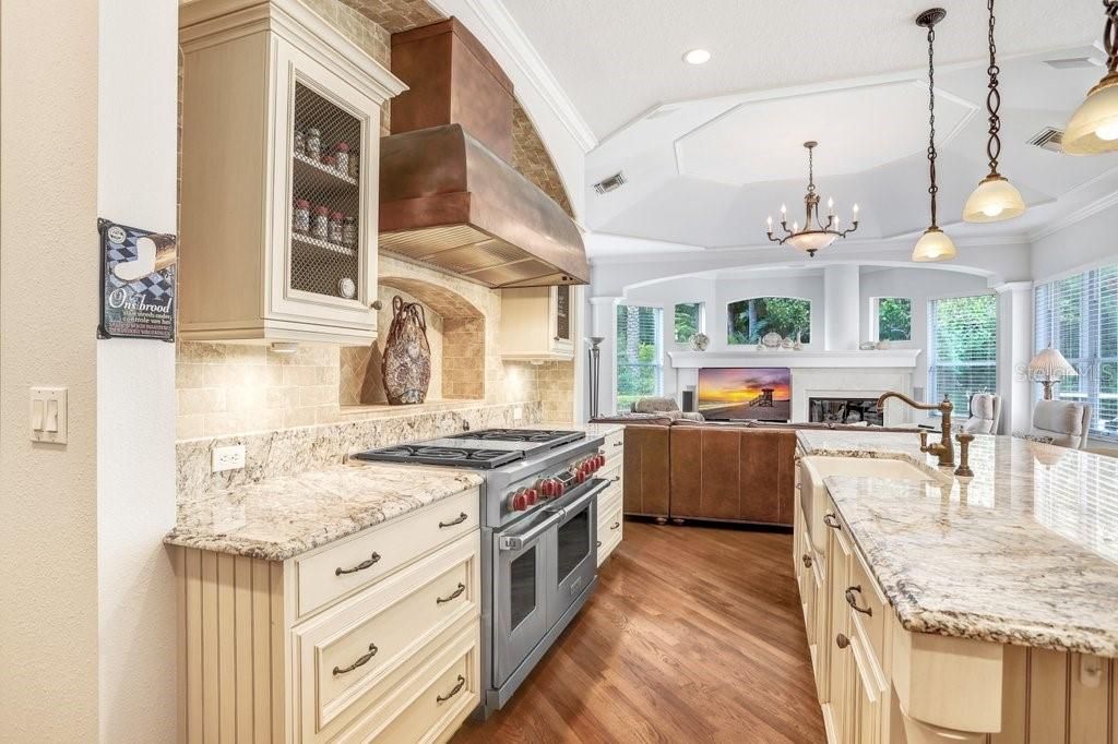 Chandelier, Interior, Kitchen, Pendant Lights, Recessed Lighting, Stainless Steel Appliances, Wood Texture Flooring