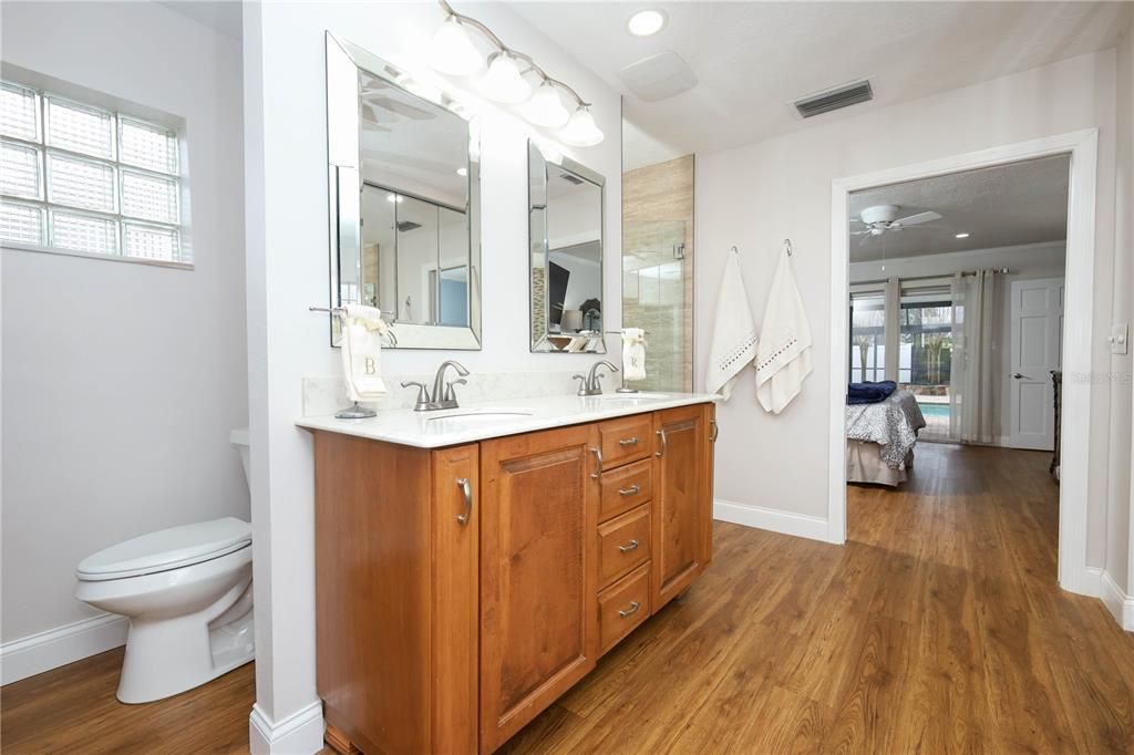 Bathroom, Dual Sink Vanities, Interior, Recessed Lighting, Wood Texture Flooring