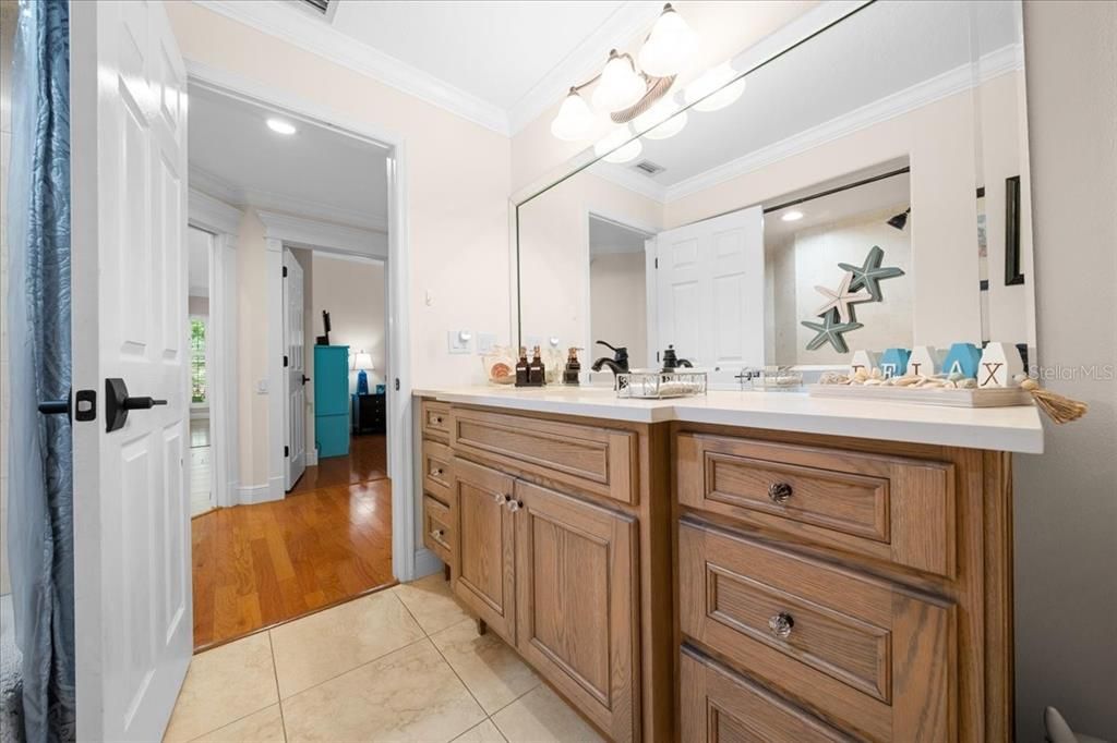 Bathroom, Dual Sink Vanities, Interior, Recessed Lighting, Wood Texture Flooring