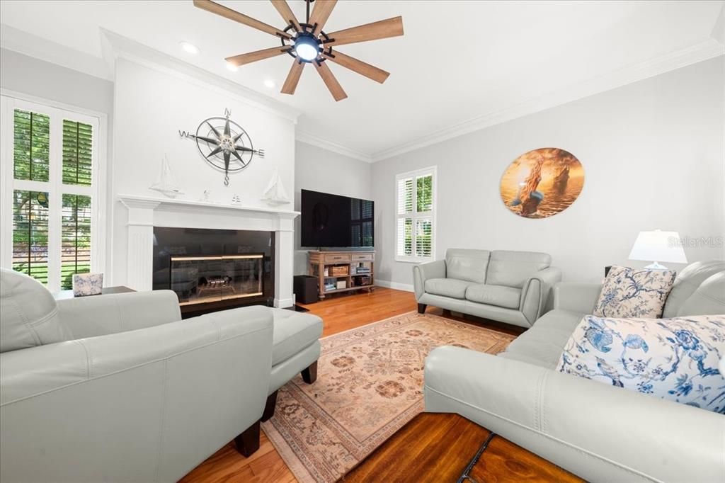 Fireplace, Interior, Living room, Recessed Lighting, Wood Texture Flooring