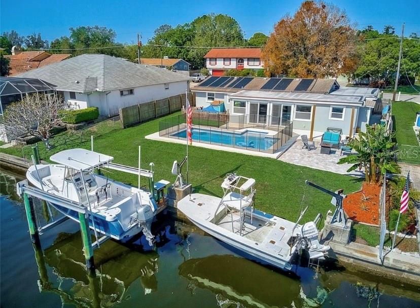 Exterior, Pool, Solar Panels