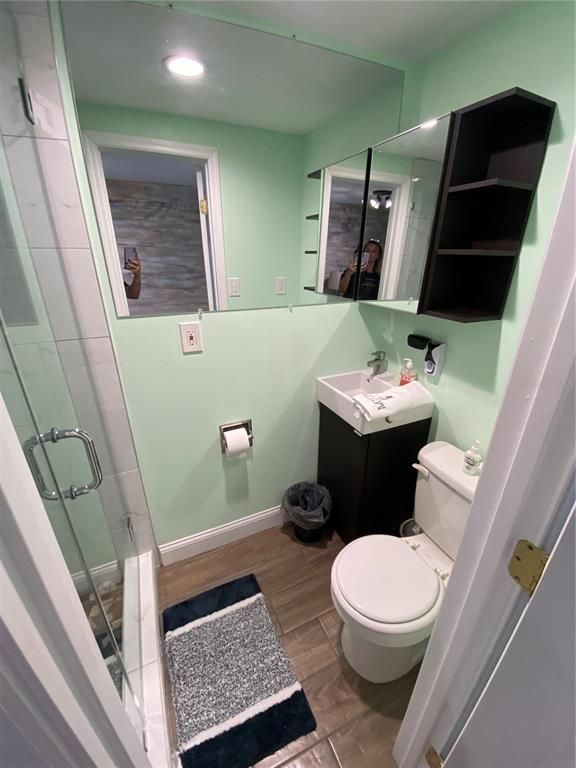 Bathroom, Glass Shower, Interior, Recessed Lighting, Wood Texture Flooring