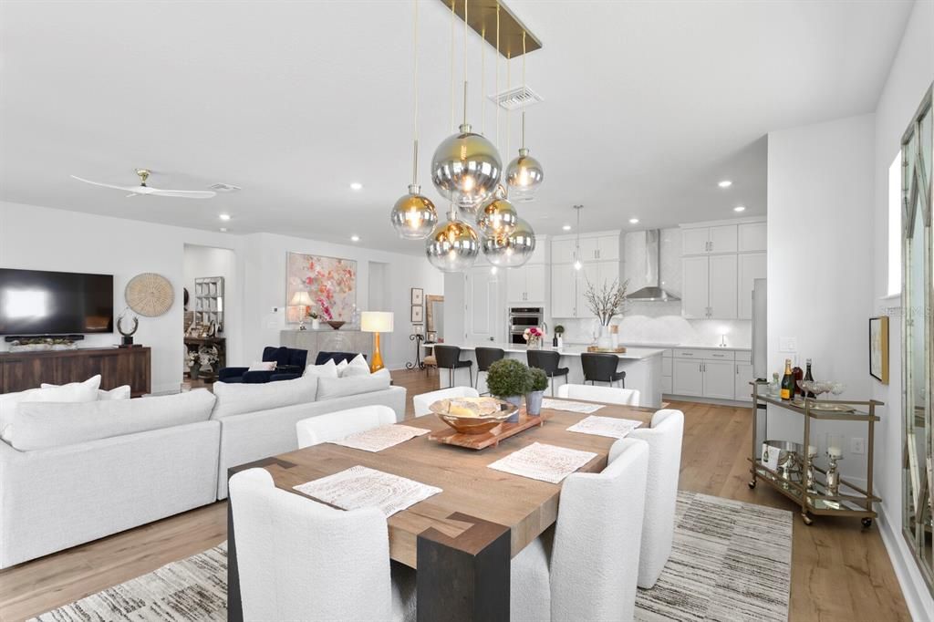 Dining room, Interior, Kitchen, Living room, Pendant Lights, Recessed Lighting, Stainless Steel Appliances, Wood Texture Flooring