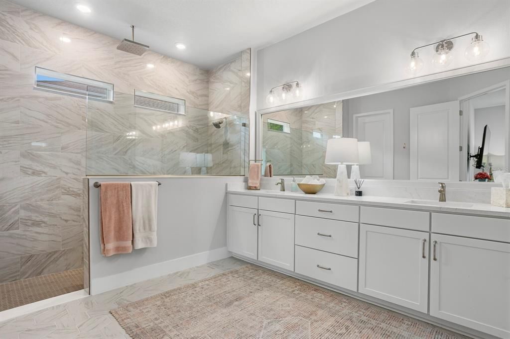 Bathroom, Dual Sink Vanities, Glass Shower, Interior, Marble Walls, Recessed Lighting