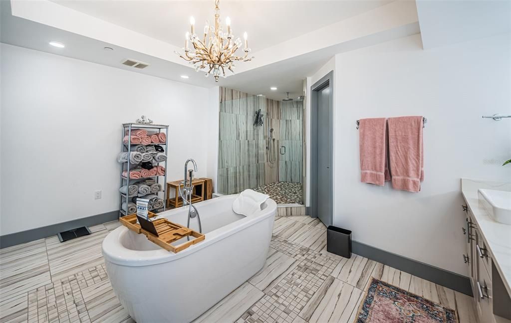 Bathroom, Chandelier, Free Standing Baths, Glass Shower, Interior, Recessed Lighting
