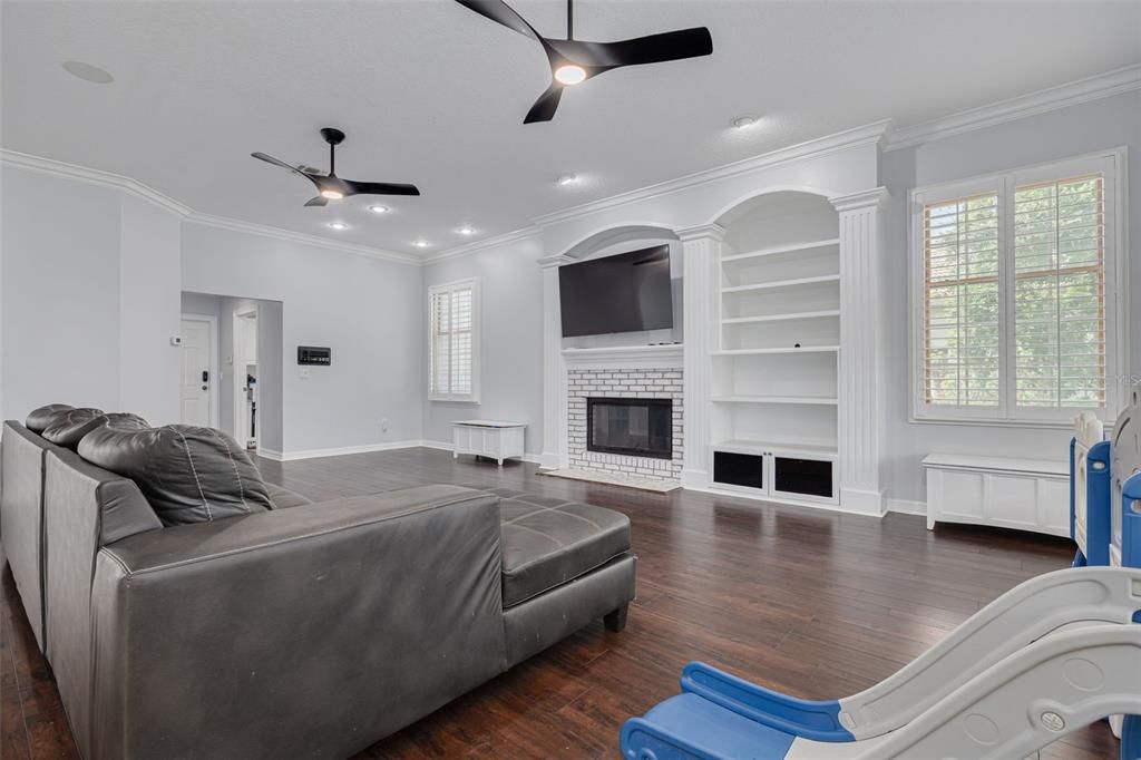 Fireplace, Interior, Living room, Recessed Lighting, Wood Texture Flooring