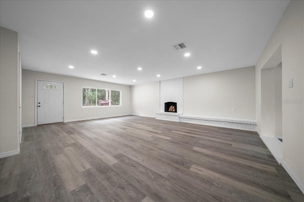 Empty room, Fireplace, Interior, Recessed Lighting, Wood Texture Flooring