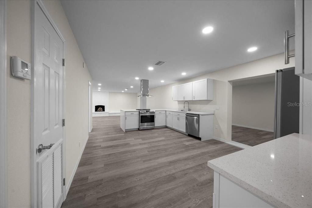 Interior, Kitchen, Recessed Lighting, Stainless Steel Appliances, Wood Texture Flooring